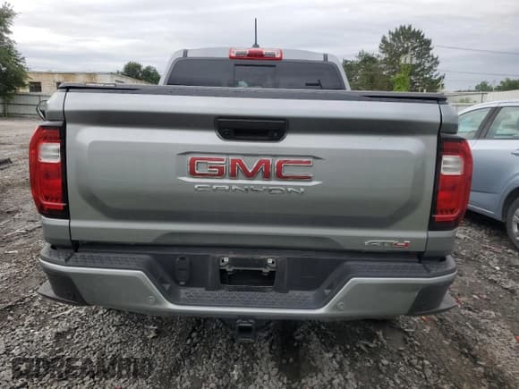 ✅ 2023 GMC Canyon 4WD AT4 • VIN: 1GTP6DEK4P1124937 • Lot: 66103474. Wystawiony na Copart z przebiegiem 10 566 mil. Bezpłatny archiwum sprzedaży aukcyjnych z USA i szczegółowy raport historii pojazdu na DreamBid. Zdjęcie 6.