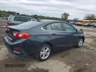 ✅ 2018 Chevrolet Cruze LT • VIN: 1G1BE5SM9J7138838 • Lot: 86299745. Listed on Copart with 60,559 mi. Free auction sales archive from the USA and detailed vehicle history report at DreamBid. Image 3.