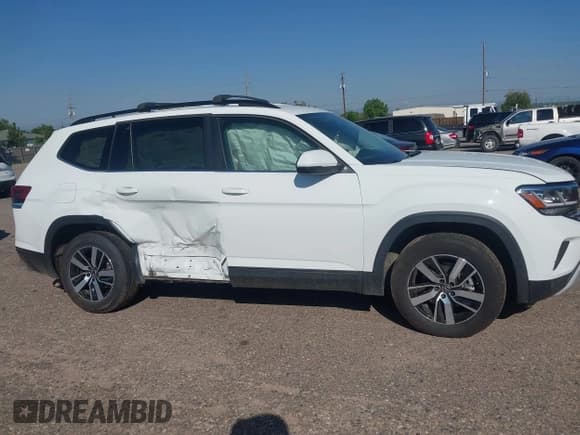 ✅ 2022 Volkswagen Atlas SE • VIN: 1V2LP2CA3NC553206 • Lot: 42608042. Listed on IAAI with 56,542 mi. Free auction sales archive from the USA and detailed vehicle history report at DreamBid. Image 12.