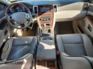 ✅ 2009 Jeep Grand Cherokee • VIN: 1J8HR68T69C520847 • Lot: 89548155. Listed on Copart with 322,340 mi. Free auction sales archive from the USA and detailed vehicle history report at DreamBid. Image 8.