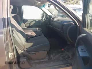 2007 Chevrolet Silverado 1500 1LT z VIN 2GCEK19J571650524, wystawiony jako IAAI lot #43556007 z przebiegiem 271 024 mil mil oraz . Historia ofert i sprzedaży dostępna na DreamBid. Obrazek 5.