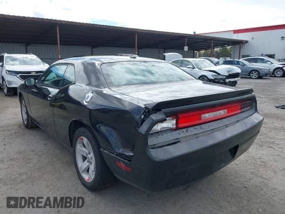 2014 Dodge Challenger R/T z VIN 2C3CDYBT6EH229572, wystawiony jako IAAI lot #43326778 z przebiegiem 125 314 mil mil oraz . Historia ofert i sprzedaży dostępna na DreamBid. Obrazek 6.