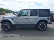 ✅ 2019 Jeep Wrangler Unlimited Sahara • VIN: 1C4HJXEN0KW596045 • Lot: 43175137. Wystawiony na IAAI z przebiegiem 88 817 mil. Bezpłatny archiwum sprzedaży aukcyjnych z USA i szczegółowy raport historii pojazdu na DreamBid. Zdjęcie 14.