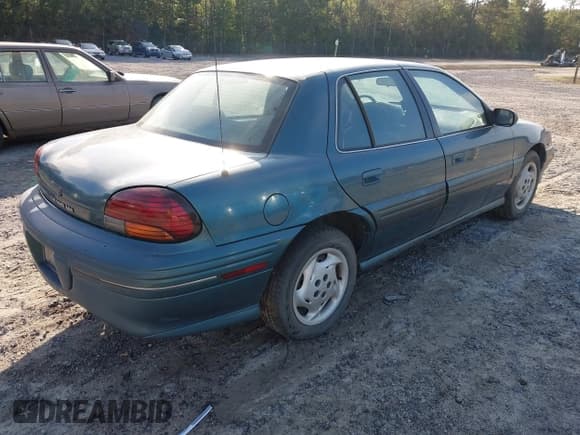 ✅ 1996 Pontiac Grand Am SE • VIN: 1G2NE52M7TC721718 • Lot: 43268073. Wystawiony na IAAI z przebiegiem 115 223 mil. Bezpłatny archiwum sprzedaży aukcyjnych z USA i szczegółowy raport historii pojazdu na DreamBid. Zdjęcie 4.