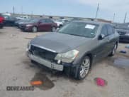 ✅ 2010 Infiniti M • VIN: JN1CY0AP2AM910957 • Lot: 41530001. Listed on IAAI with 152,849 mi. Free auction sales archive from the USA and detailed vehicle history report at DreamBid. Image 2.