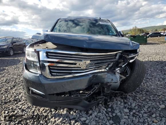 2020 Chevrolet Tahoe Premier with VIN 1GNSKCKJ0LR101198, listed as a Copart auction lot 84955895 with 99,414 mi miles and Salvage title. Bid and sale history available at DreamBid. Image 5.