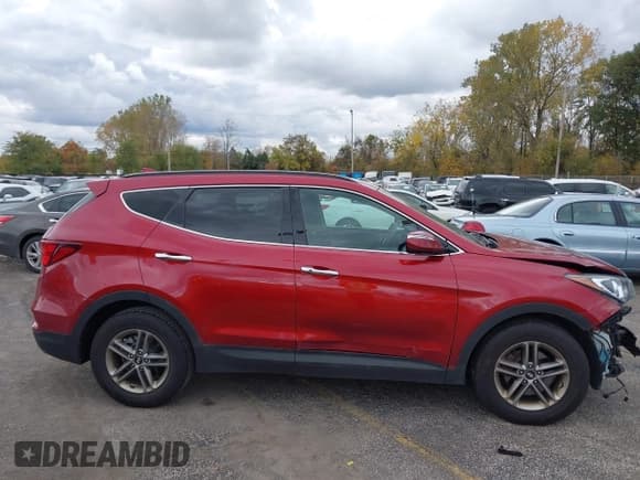 ✅ 2018 Hyundai Santa Fe 2.4L • VIN: 5XYZU3LB4JG500071 • Lot: 43533985. Listed on IAAI with 111,303 mi. Free auction sales archive from the USA and detailed vehicle history report at DreamBid. Image 14.