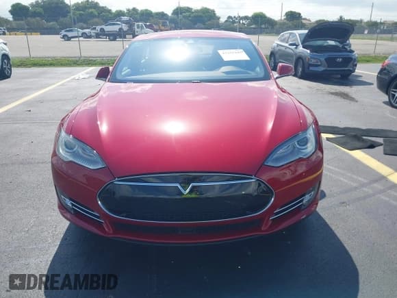 ✅ 2015 Tesla Model S 85 • VIN: 5YJSA1S11FF080601 • Lot: 42355445. Listed on IAAI with 56,391 mi. Free auction sales archive from the USA and detailed vehicle history report at DreamBid. Image 12.
