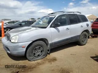 ✅ 2002 Hyundai Santa Fe GLS • VIN: KM8SC73D22U198787 • Лот: 53754875. Опубликован ранее на Copart с пробегом 251 804 миль. Бесплатный доступ к архиву аукционных продаж из США и подробный отчёт об истории автомобиля на DreamBid. Изображение 1.