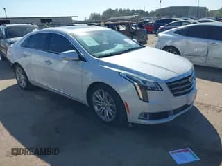 ✅ 2018 Cadillac XTS Luxury • VIN: 2G61M5S39J9162717 • Lot: 43416424. Listed on IAAI with 84,559 mi. Free auction sales archive from the USA and detailed vehicle history report at DreamBid. Image 1.