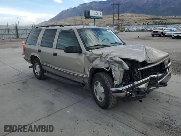 1999 Chevrolet Tahoe Z71 с VIN 1GNEK13R2XJ307813, выставлен на аукционе Copart как лот 82113345 с пробегом 240 647 миль миль и Списание • Salvage title. История ставок и продаж доступна на DreamBid. Изображение 4.