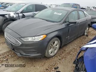 ✅ 2018 Ford Fusion S • VIN: 3FA6P0UU3JR122992 • Lot: 85011875. Listed on Copart with 93,461 mi. Free auction sales archive from the USA and detailed vehicle history report at DreamBid. Image 1.