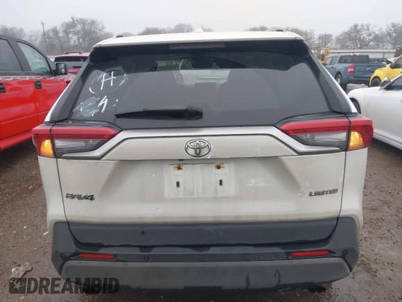 ✅ 2021 Toyota RAV4 Limited • VIN: JTMY1RFV0MJ023477 • Lot: 41447513. Listed on IAAI with 69,999 mi. Free auction sales archive from the USA and detailed vehicle history report at DreamBid. Image 16.