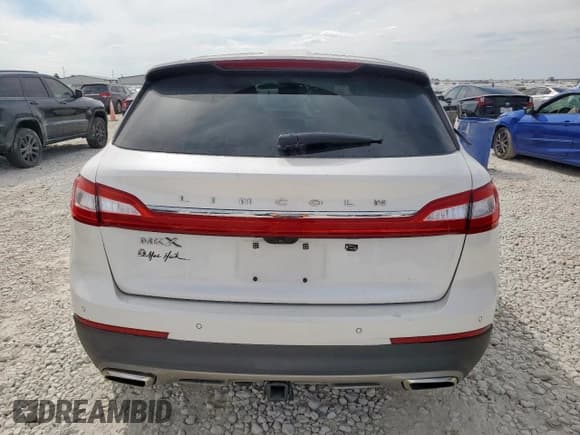 ✅ 2016 Lincoln MKX Reserve • VIN: 2LMPJ6LR6GBL63453 • Lot: 84600455. Listed on Copart with 30,646 mi. Free auction sales archive from the USA and detailed vehicle history report at DreamBid. Image 6.