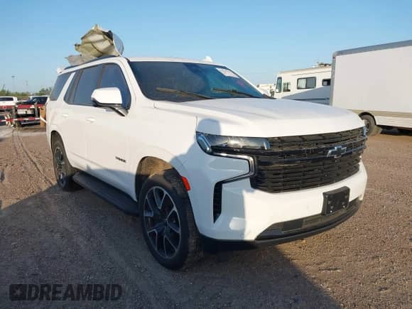 2023 Chevrolet Tahoe RST with VIN 1GNSKRKD4PR427153, listed as a IAAI auction lot 41906796 with 23,113 mi miles and . Bid and sale history available at DreamBid. Image 1.