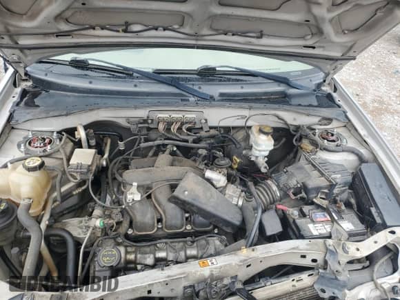 2006 Mercury Mariner Luxury z VIN 4M2CU56196KJ17209, wystawiony jako Copart lot #58450665 z przebiegiem 239 728 mil mil oraz Szkoda całkowita • Salvage title. Historia ofert i sprzedaży dostępna na DreamBid. Obrazek 12.