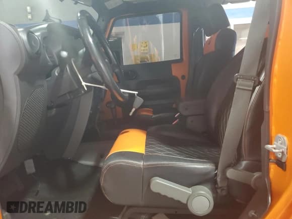 ✅ 2007 Jeep Wrangler Unlimited Sahara • VIN: 1J4GB59157L203549 • Лот: 91144375. Опубликован ранее на Copart с пробегом 144 811 миль. Бесплатный доступ к архиву аукционных продаж из США и подробный отчёт об истории автомобиля на DreamBid. Изображение 7.