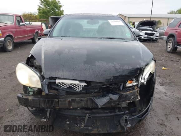 2014 Chevrolet Impala LT with VIN 2G1WB5E30E1121412, listed as a IAAI auction lot 43380958 with 116,443 mi miles and . Bid and sale history available at DreamBid. Image 13.