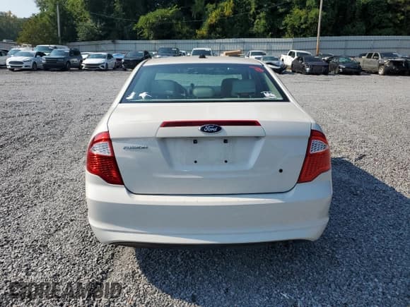 ✅ 2012 Ford Fusion S • VIN: 3FAHP0GA1CR428991 • Лот: 69211585. Опубликован ранее на Copart с пробегом 130 148 миль. Бесплатный доступ к архиву аукционных продаж из США и подробный отчёт об истории автомобиля на DreamBid. Изображение 6.