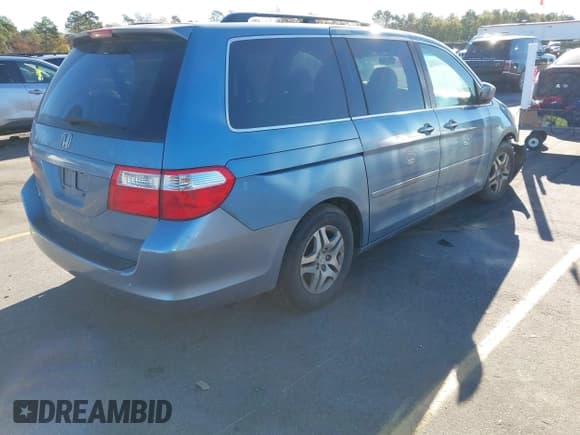 ✅ 2007 Honda Odyssey EX • VIN: 5FNRL38467B036519 • Lot: 43702862. Listed on IAAI with 218,014 mi. Free auction sales archive from the USA and detailed vehicle history report at DreamBid. Image 4.