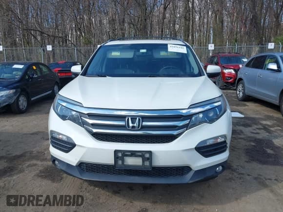 ✅ 2017 Honda Pilot EX-L • VIN: 5FNYF6H71HB061036 • Lot: 41891446. Listed on IAAI with 194,566 mi. Free auction sales archive from the USA and detailed vehicle history report at DreamBid. Image 12.