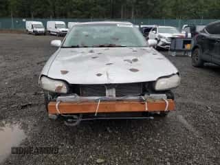 2003 Chevrolet Malibu LS z VIN 1G1NE52J33M604691, wystawiony jako Copart lot #84902294 z przebiegiem Nie podano mil oraz Szkoda całkowita • Salvage title. Historia ofert i sprzedaży dostępna na DreamBid. Obrazek 5.