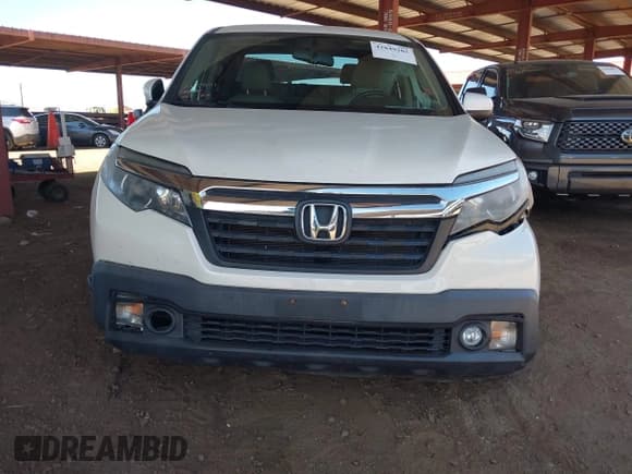 ✅ 2018 Honda Ridgeline RTL-T • VIN: 5FPYK3F6XJB007770 • Lot: 42849205. Listed on IAAI with 77,701 mi. Free auction sales archive from the USA and detailed vehicle history report at DreamBid. Image 6.