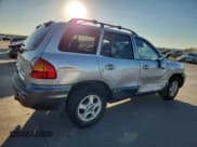 ✅ 2003 Hyundai Santa Fe GLS • VIN: KM8SC13E13U460984 • Lot: 87202585. Wystawiony na Copart z przebiegiem 96 517 mil. Bezpłatny archiwum sprzedaży aukcyjnych z USA i szczegółowy raport historii pojazdu na DreamBid. Zdjęcie 3.