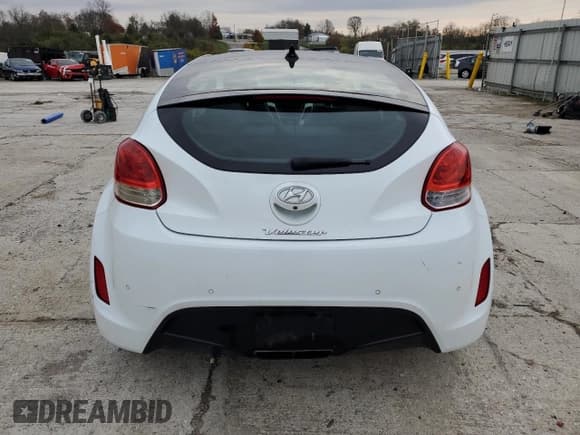 ✅ 2014 Hyundai Veloster • VIN: KMHTC6ADXEU184741 • Lot: 81136964. Wystawiony na Copart z przebiegiem 85 453 mil. Bezpłatny archiwum sprzedaży aukcyjnych z USA i szczegółowy raport historii pojazdu na DreamBid. Zdjęcie 6.