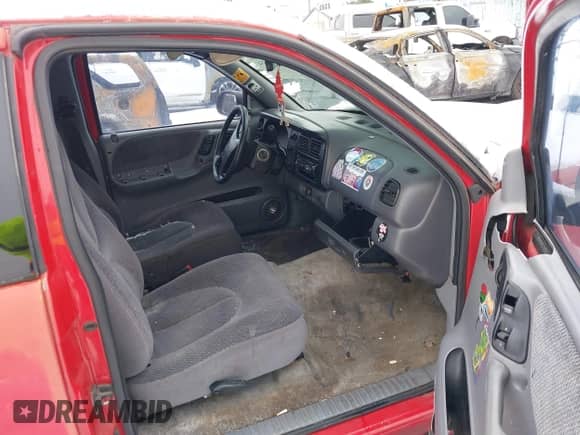 1997 Dodge Dakota z VIN 1B7GL23Y7VS134373, wystawiony jako IAAI lot #41573554 z przebiegiem 201 659 mil mil oraz . Historia ofert i sprzedaży dostępna na DreamBid. Obrazek 5.