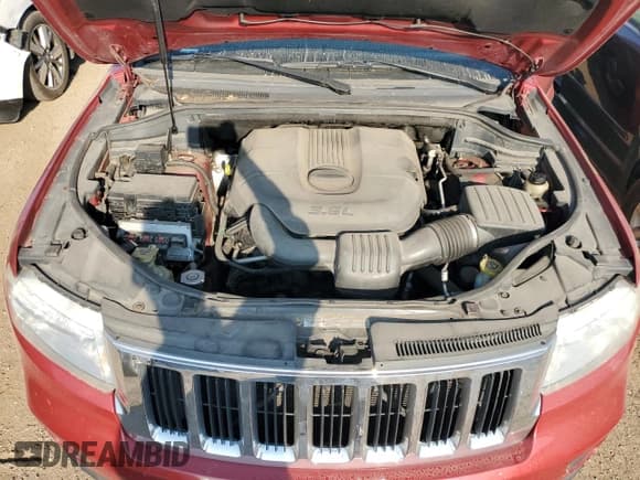 ✅ 2011 Jeep Grand Cherokee 70th Anniversary • VIN: 1J4RR4GG1BC515396 • Lot: 67671155. Wystawiony na Copart z przebiegiem 167 153 mil. Bezpłatny archiwum sprzedaży aukcyjnych z USA i szczegółowy raport historii pojazdu na DreamBid. Zdjęcie 11.