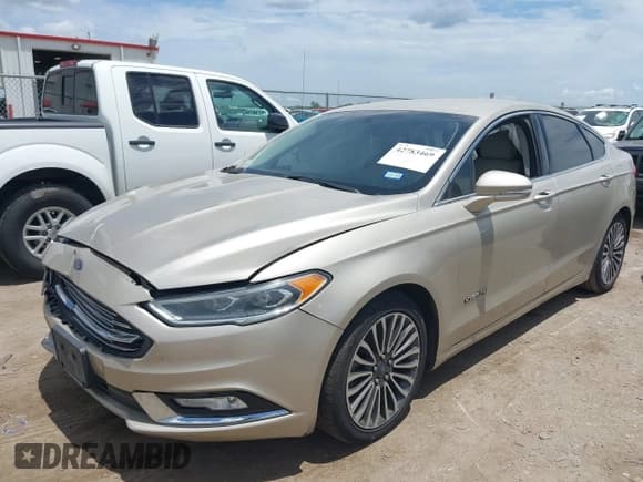 ✅ 2017 Ford Fusion Hybrid Titanium • VIN: 3FA6P0RU7HR388518 • Lot: 42783469. Listed on IAAI with 90,081 mi. Free auction sales archive from the USA and detailed vehicle history report at DreamBid. Image 2.