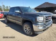 ✅ 2017 GMC Sierra 1500 SLT • VIN: 3GTU2NEC2HG270463 • Lot: 91568555. Listed on Copart with 127,936 mi. Free auction sales archive from the USA and detailed vehicle history report at DreamBid. Image 4.