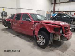 2008 Dodge Dakota с VIN 1D7HW38N38S535025, выставлен на аукционе Copart как лот 77204754 с пробегом 245 225 миль миль и Списание • Salvage title. История ставок и продаж доступна на DreamBid. Изображение 4.