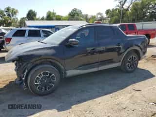 2024 Hyundai Santa Cruz SEL z VIN 5NTJCDAEXRH086304, wystawiony jako Copart lot #71796694 z przebiegiem 6 944 mil mil oraz Szkoda całkowita • Salvage title. Historia ofert i sprzedaży dostępna na DreamBid. Obrazek 1.