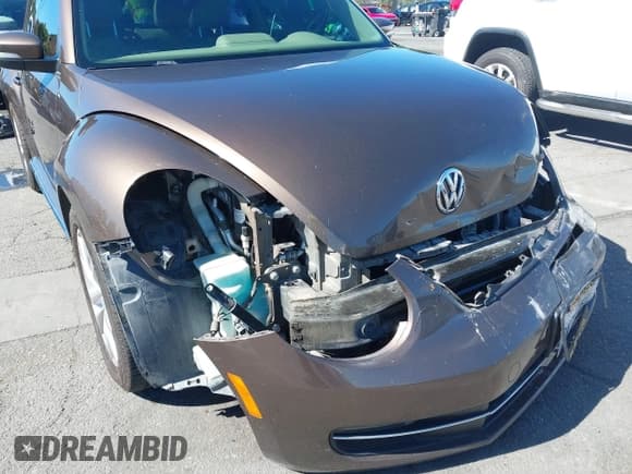 ✅ 2014 Volkswagen Beetle 2.0L TDI w/Sun/Sound/Nav • VIN: 3VWJL7AT1EM617082 • Лот: 43442124. Опубликован ранее на IAAI с пробегом 110 037 миль. Бесплатный доступ к архиву аукционных продаж из США и подробный отчёт об истории автомобиля на DreamBid. Изображение 6.