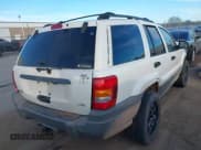 ✅ 2002 Jeep Grand Cherokee Laredo • VIN: 1J4GX48N82C186688 • Lot: 43657283. Listed on IAAI with 214,970 mi. Free auction sales archive from the USA and detailed vehicle history report at DreamBid. Image 4.