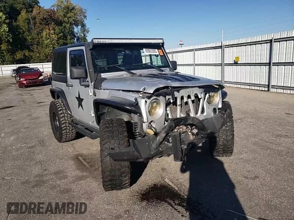 ✅ 2010 Jeep Wrangler Sport • VIN: 1J4GA2D11AL187964 • Лот: 82663305. Опубликован ранее на Copart с пробегом 142 029 миль. Бесплатный доступ к архиву аукционных продаж из США и подробный отчёт об истории автомобиля на DreamBid. Изображение 13.
