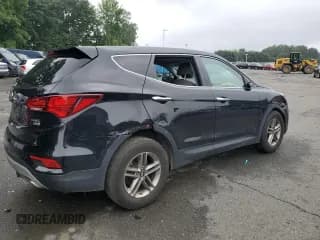 ✅ 2018 Hyundai Santa Fe 2.4L • VIN: 5XYZTDLB9JG569962 • Лот: 66455414. Опубликован ранее на Copart с пробегом 100 231 миль. Бесплатный доступ к архиву аукционных продаж из США и подробный отчёт об истории автомобиля на DreamBid. Изображение 3.