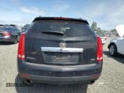 ✅ 2012 Cadillac SRX Performance Collection • VIN: 3GYFNEE39CS626584 • Lot: 55050825. Listed on Copart with 165,114 mi. Free auction sales archive from the USA and detailed vehicle history report at DreamBid. Image 6.