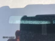 ✅ 2021 Honda Odyssey Touring • VIN: 5FNRL6H85MB013894 • Lot: 71153575. Listed on Copart with 60,452 mi. Free auction sales archive from the USA and detailed vehicle history report at DreamBid. Image 14.