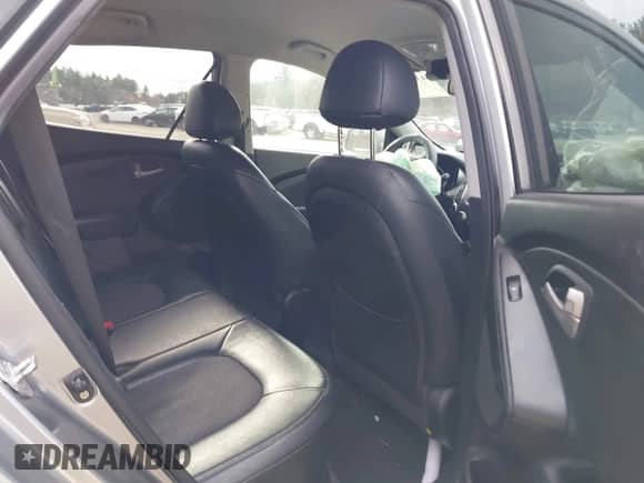 2012 Hyundai Tucson GLS with VIN KM8JU3AC3CU455825, listed as a IAAI auction lot 43611561 with 182,582 mi miles and . Bid and sale history available at DreamBid. Image 8.