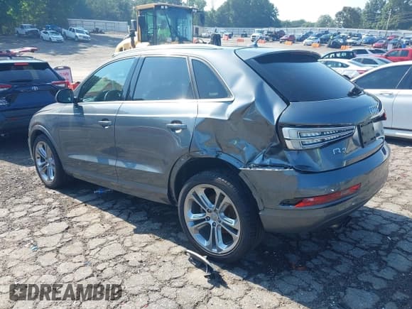 ✅ 2017 Audi Q3 Premium Plus • VIN: WA1JCCFS8HR003056 • Lot: 42570081. Listed on IAAI with 82,210 mi. Free auction sales archive from the USA and detailed vehicle history report at DreamBid. Image 3.