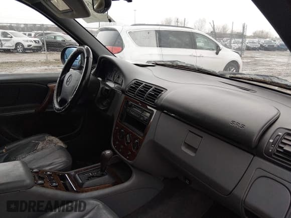 ✅ 1998 Mercedes-Benz M 320/430/500 • VIN: 4JGAB54EXWA012141 • Lot: 43884204. Listed on IAAI with 250,945 mi. Free auction sales archive from the USA and detailed vehicle history report at DreamBid. Image 5.