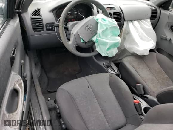 2003 Hyundai Accent GL with VIN KMHCG35C33U261046, listed as a Copart auction lot 48846125 with 108,742 mi miles and Salvage title. Bid and sale history available at DreamBid. Image 8.