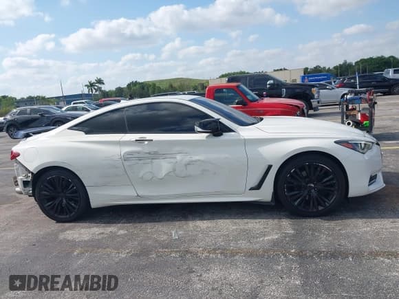 ✅ 2017 Infiniti Q60 Premium • VIN: JN1CV7EK7HM110553 • Lot: 42115242. Listed on IAAI with 83,129 mi. Free auction sales archive from the USA and detailed vehicle history report at DreamBid. Image 14.