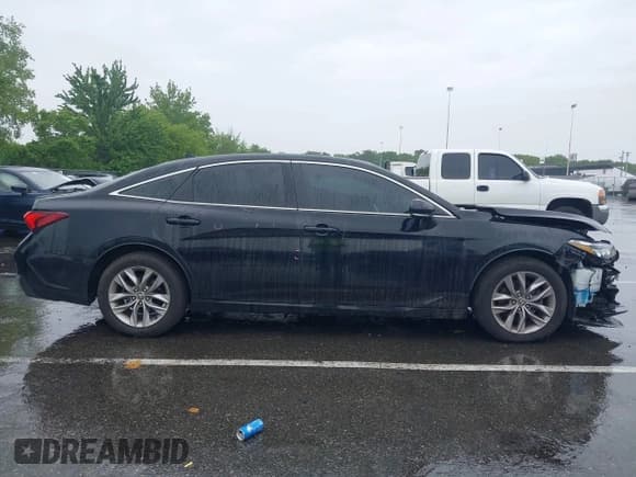 ✅ 2021 Toyota Avalon XLE • VIN: 4T1AZ1FB8MU059364 • Lot: 42368655. Listed on IAAI with 60,702 mi. Free auction sales archive from the USA and detailed vehicle history report at DreamBid. Image 13.