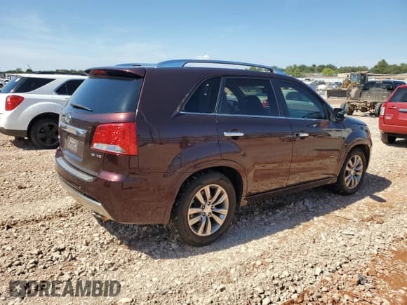 ✅ 2012 Kia Sorento SX • VIN: 5XYKW4A20CG265935 • Lot: 80266425. Listed on Copart with 191,135 mi. Free auction sales archive from the USA and detailed vehicle history report at DreamBid. Image 3.
