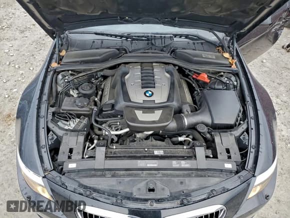 ✅ 2010 BMW 6 Series 650i • VIN: WBAEA5C54ACV93771 • Лот: 96449905. Опубликован ранее на Copart с пробегом 74 712 миль. Бесплатный доступ к архиву аукционных продаж из США и подробный отчёт об истории автомобиля на DreamBid. Изображение 11.