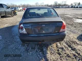 2005 Hyundai Elantra GLS z VIN KMHDN46D65U082445, wystawiony jako Copart lot #83571274 z przebiegiem 207 689 mil mil oraz Szkoda całkowita • Salvage title. Historia ofert i sprzedaży dostępna na DreamBid. Obrazek 6.